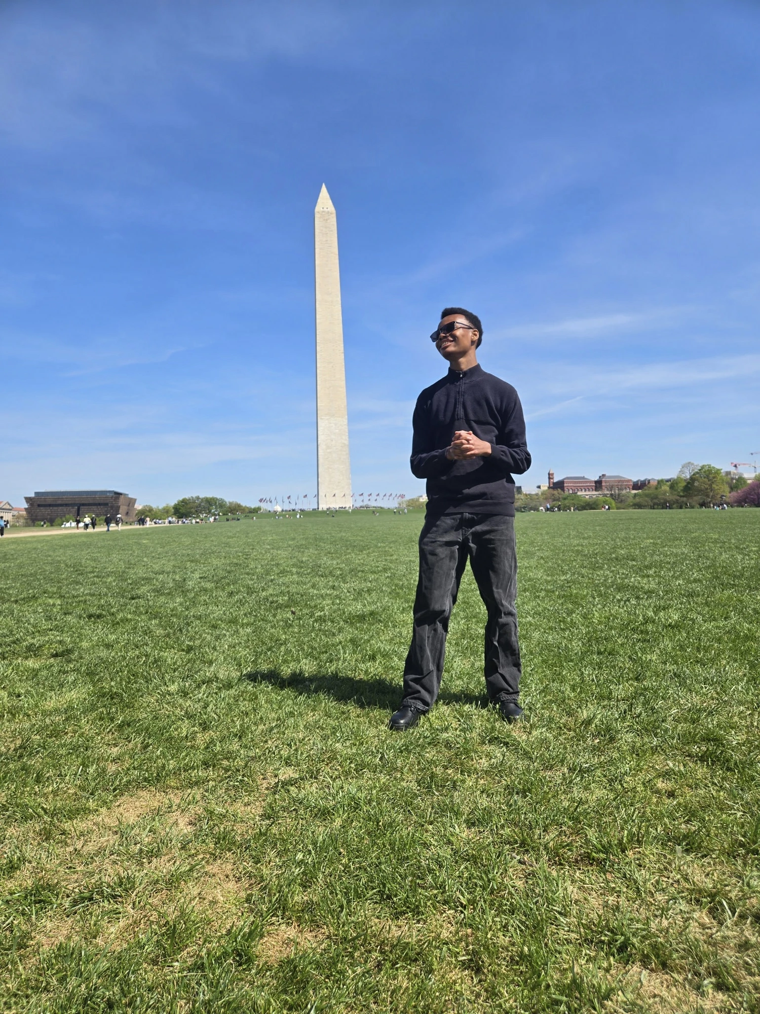 Jeremiah Womack standing before the Washington Monument